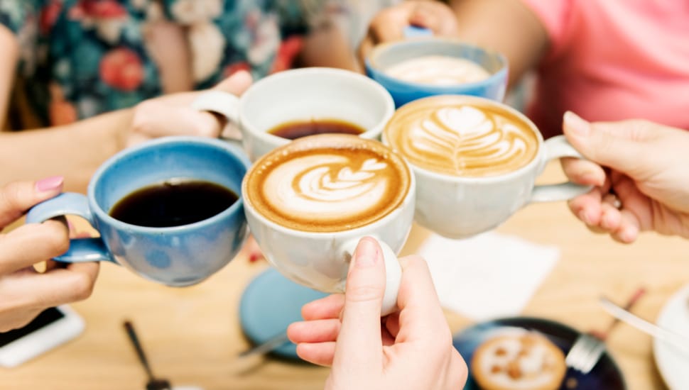 Friends enjoying coffee together.