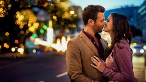 Couple kissing on the street