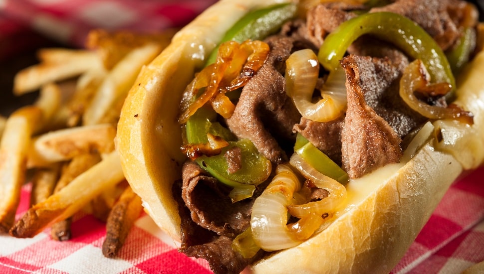 Philadelphia Cheesesteak Sandwich with Onions and Peppers.