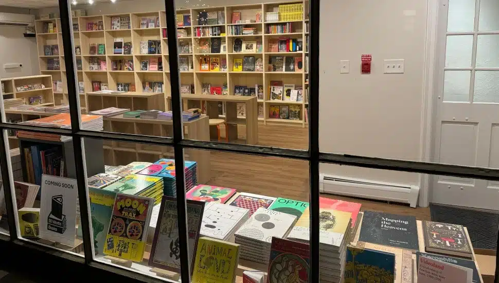 Exterior of 50 Watts Books with numerous books in view.