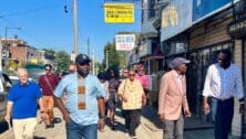 People walking in Southwest Philadelphia's "Africatown."