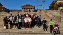 Several women outside the Philadelphia Museum of Art with the Philly Slow Girl Run Club