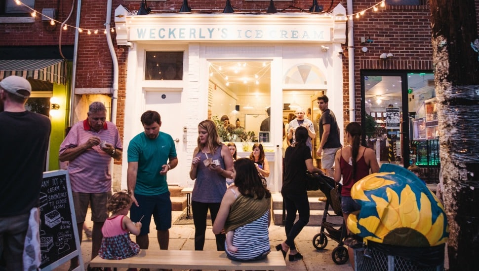 People enjoying ice cream outside of Weckerly's Ice Cream.
