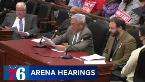 People during the 76 Place arena hearings.