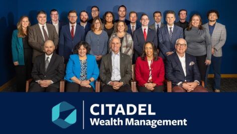 Group photo of a wealth management team.