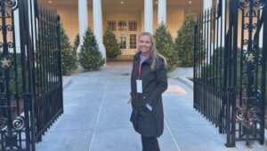 Nicole Radio standing outside White House.