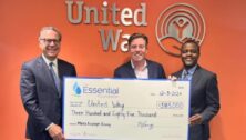 Essential Utilities Chairman and CEO, Christopher Franklin (left), and Aqua Vice President of Operations, Mark McKoy (right), who chaired the employee giving campaign, visited United Way headquarters in Philadelphia to present the matching donation check of $385,000 to Bill Golderer (center), President and CEO of the United Way of Greater Philadelphia and Southern New Jersey.