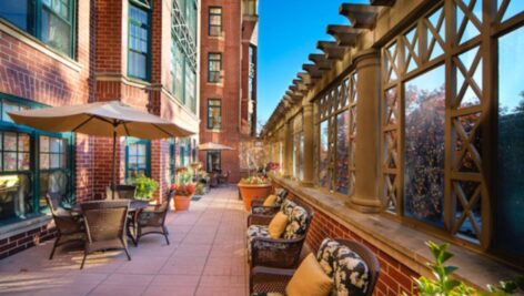 An outdoor terrace at a senior living community.