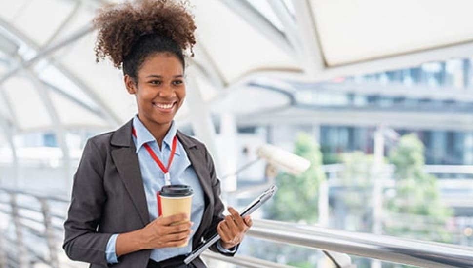 college student with coffee in hand