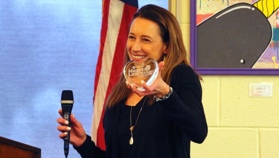 Teacher receives award for excellence.