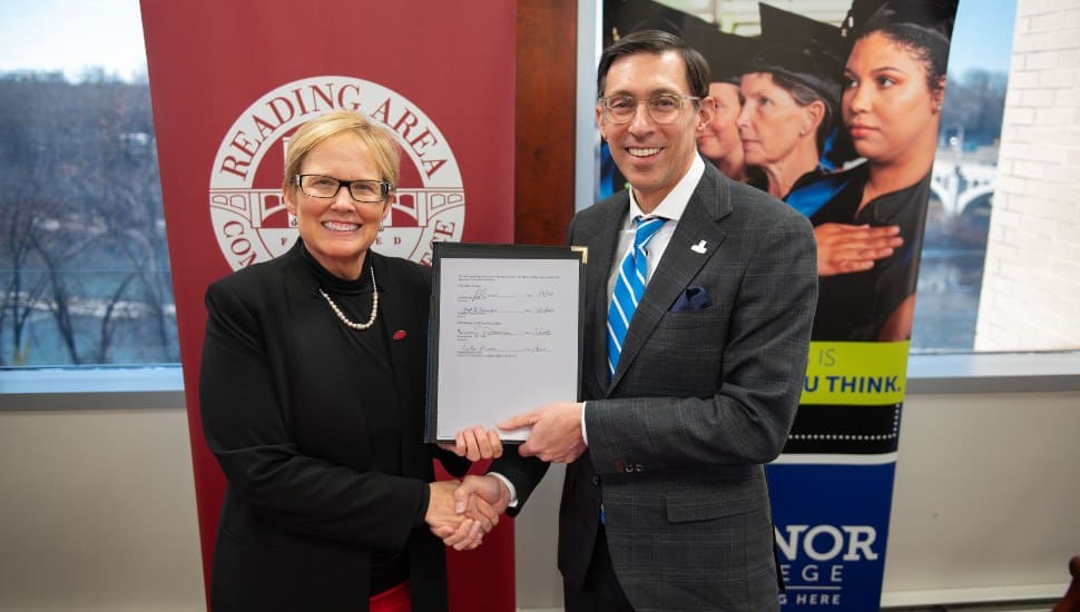 Manor College President Dr. Jonathan Peri (R) and Reading Area Community College President Dr. Susan Looney (L).