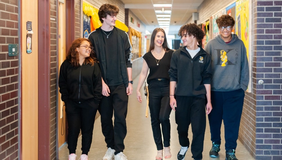 Students walking in a hallway