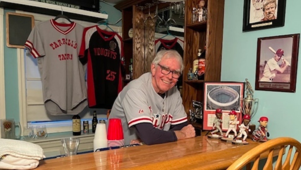 Tom Holland with Philly sports teams memorabilia in the background.