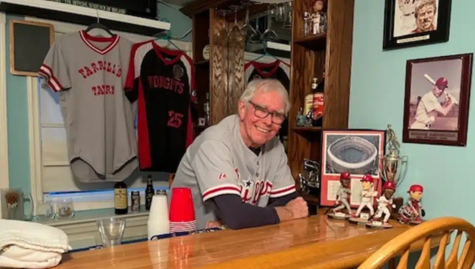 Tom Holland with Philly sports teams memorabilia in the background.