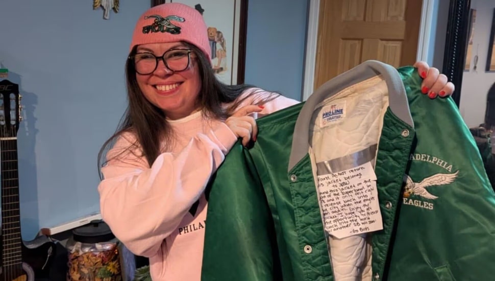 Amy Rannabarger poses with Eagles jacket.