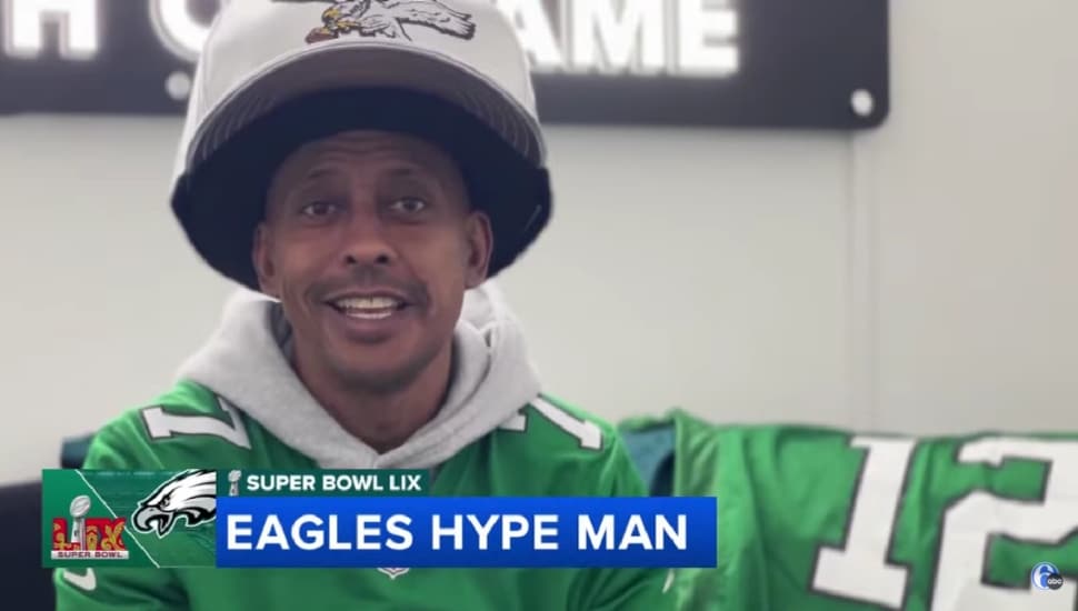 Gillie Da Kid in Eagles gear.