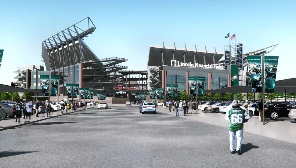 A wideshot of Lincoln Financial Field with people walking towards it.