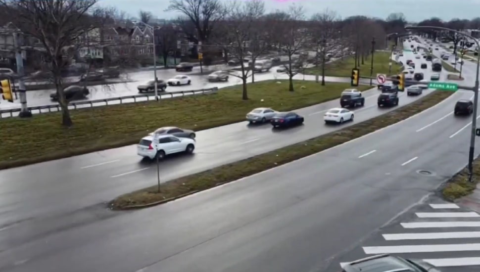 Cars being driven on Roosevelt Boulevard.