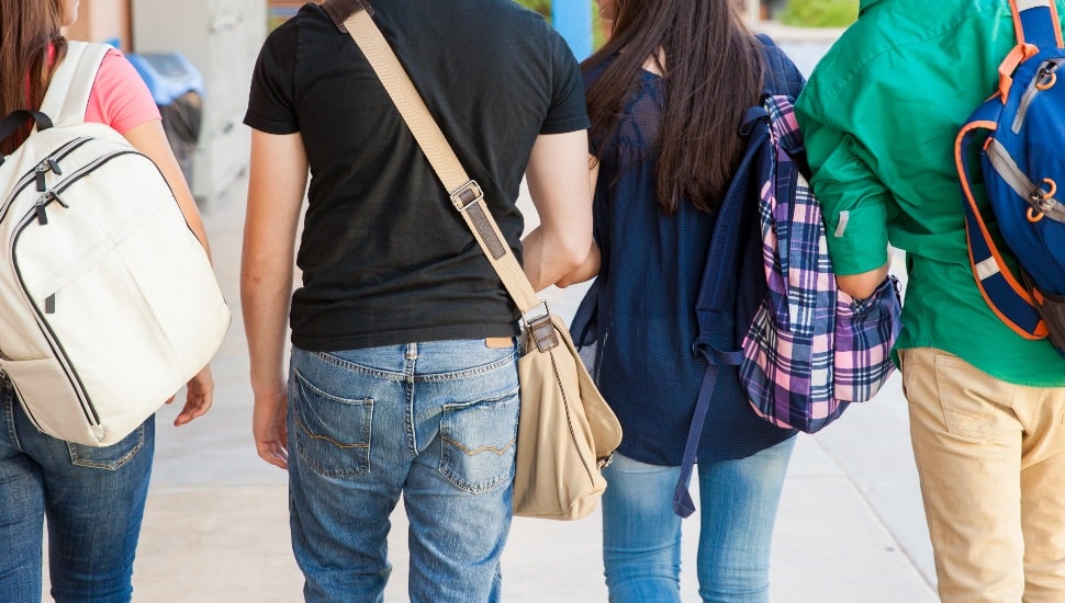 High school students walking to class.