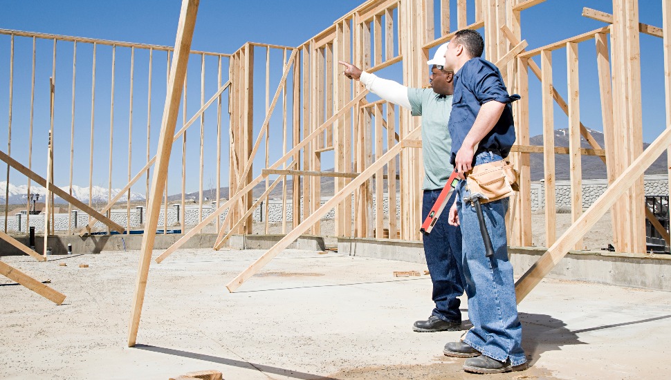 Builders on construction site