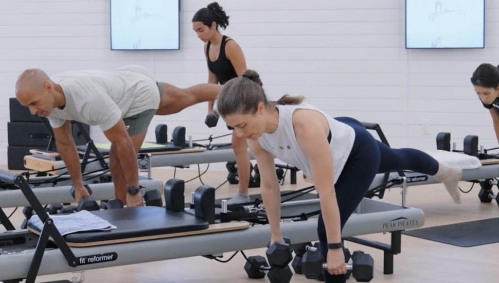 People working out in a studio.