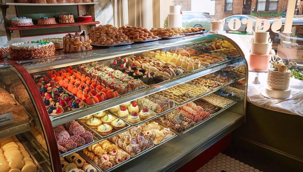 Inside Isgro Pastries with a wide variety of baked goods.