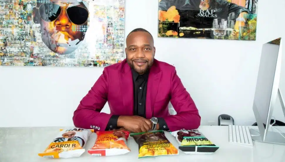 James Lindsay in his office with Rap Snacks on his desk.