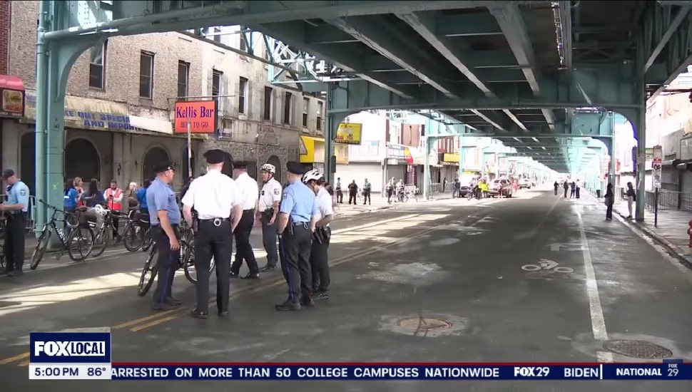 Police presence under the El in Kensington.