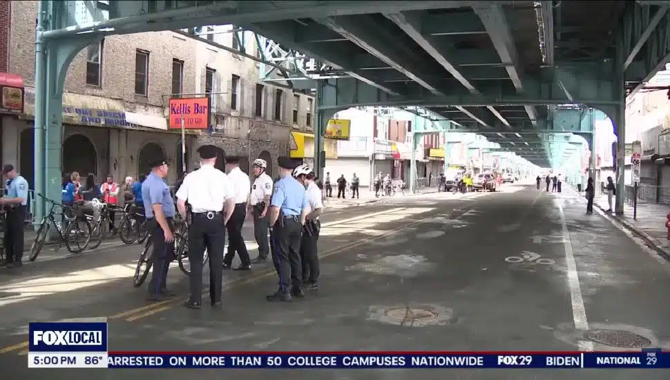 Police presence under the El in Kensington.