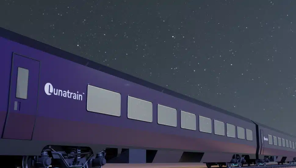 A rendering of Lunatrain traveling at night.