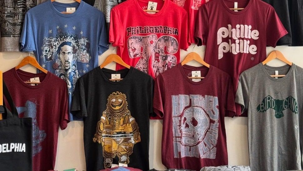 A variety of Phillies, and other local sports team shirts.