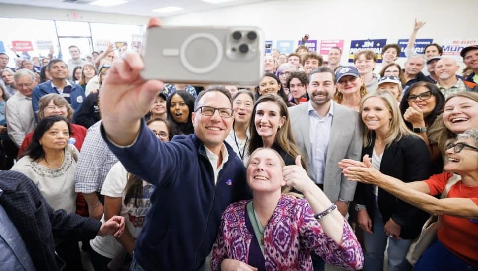 Josh Shapiro takes a selfie with constituents.