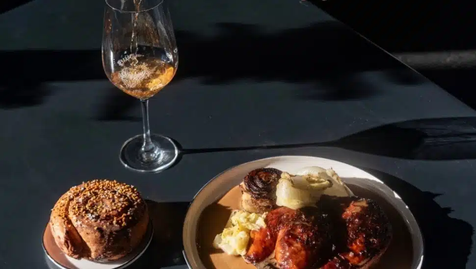 Chicken, kohlrabi, caggage, foie gras and honey-onion bread with a glass of wine.
