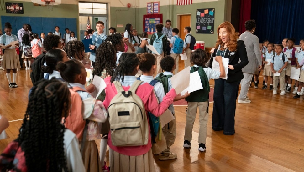 Kids on Abbott Elementary handing over permission slips to teachers.