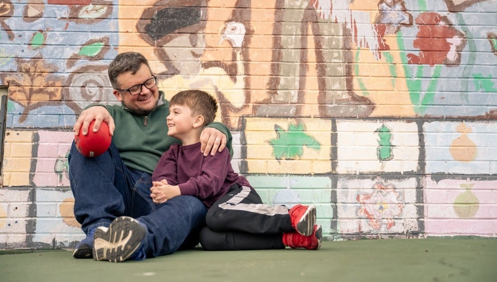 Joe Gidjunis with his young son.