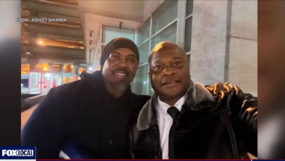 Ashley Shumba with former Philadelphia Eagles player Brian Dawkins.