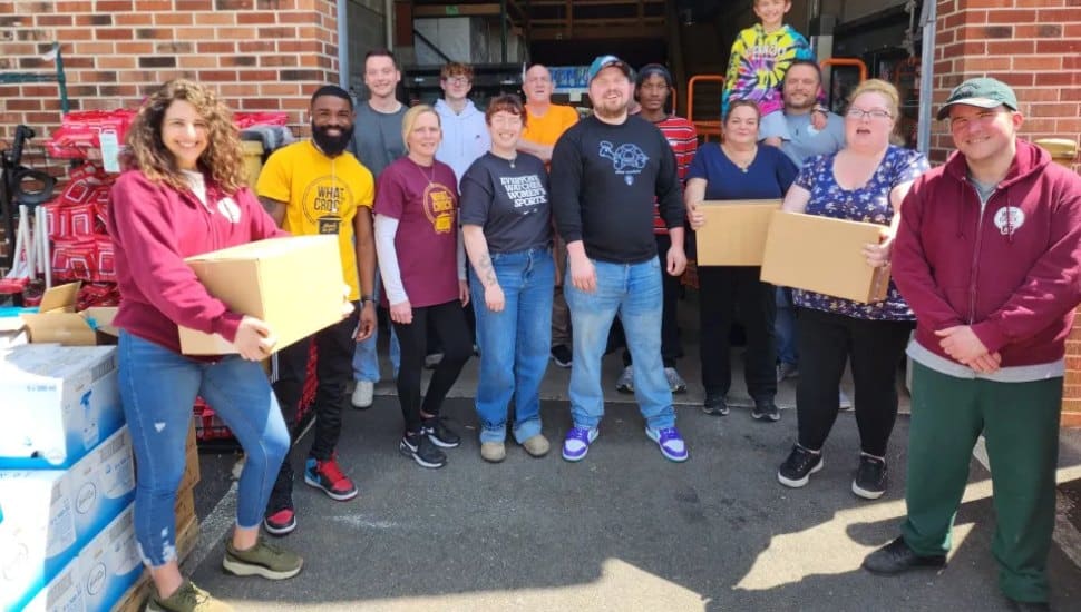 The team at Bulk Foods Delco in Collingdale prepare complimentary foood packages for the laid off employees at Crozer-Chester Medical Center and Taylor Hospital.