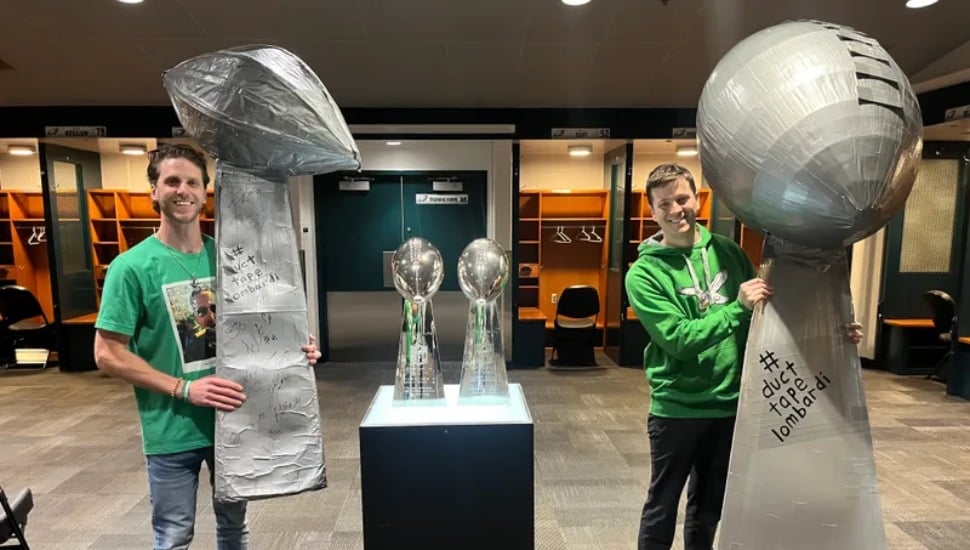 Michael Howanski and James Knox with their duct tape Lombardi trophies.