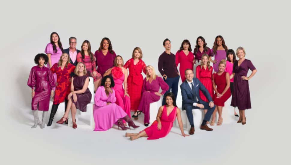 HSN hosts wearing red and pink in a heart-shape position.