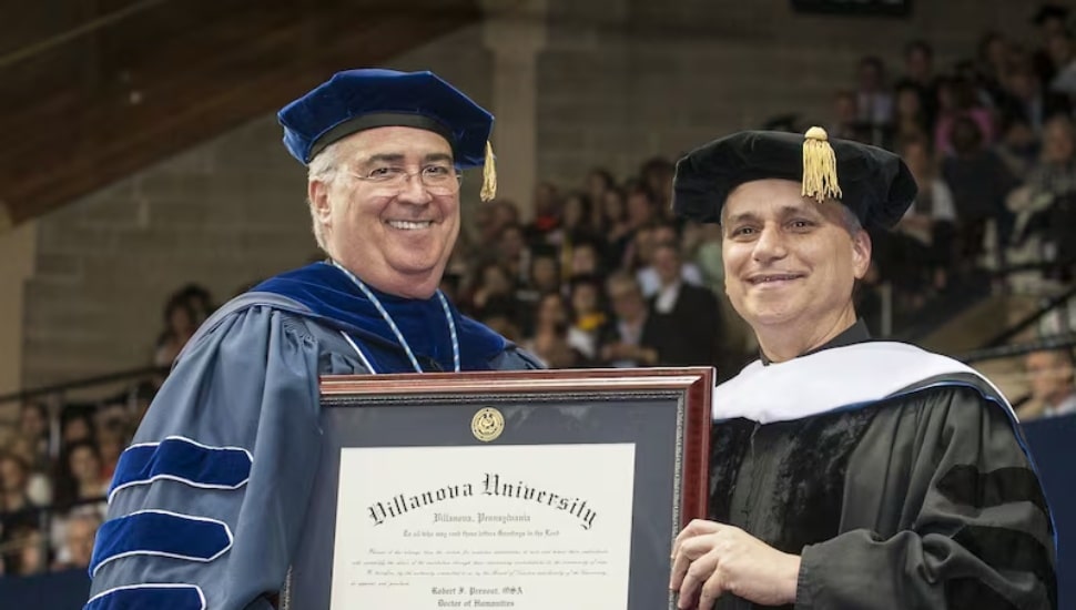 The Rev. Peter M. Donohue, president of Villanova University, presents an honorary doctorate to Bishop Robert Prevost at Villanova's 2014 commencement.