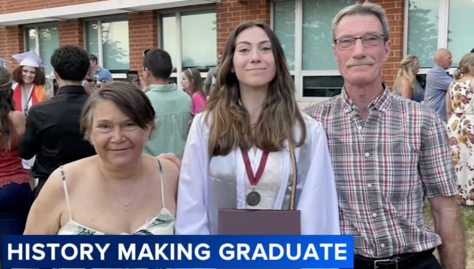 Sarah Potter in center in a photo with older couple, likely relatives.