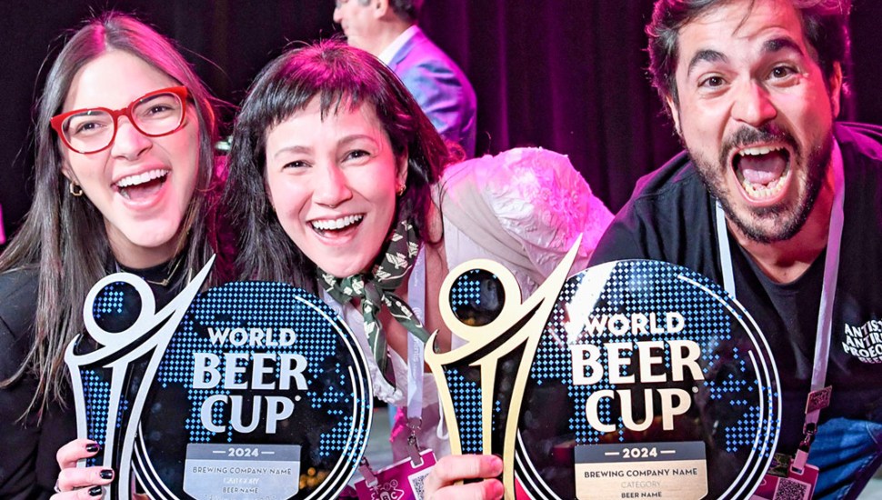 World Beer Cup winners on stage with awards.