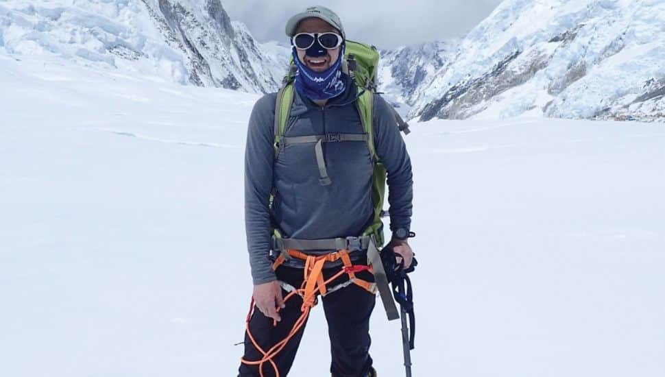 Bruce Terry in climbing gear in the snow on Mt. Everest.