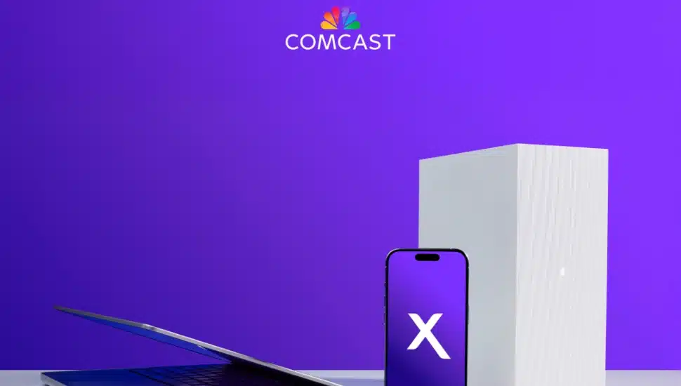 Comcast router, smartphone, and laptop.