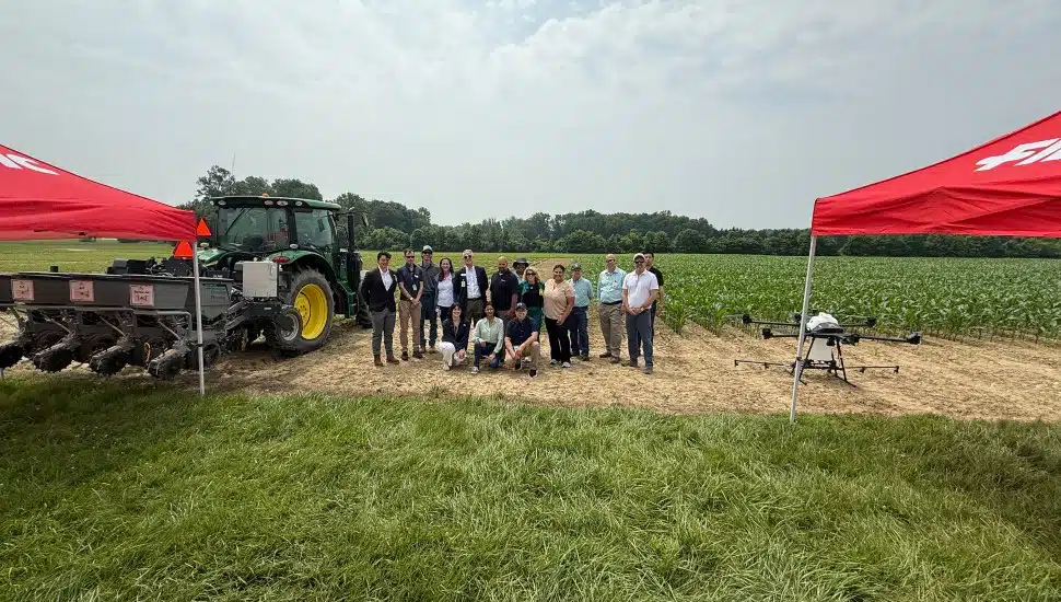 FMC Corporation representatives in a field.