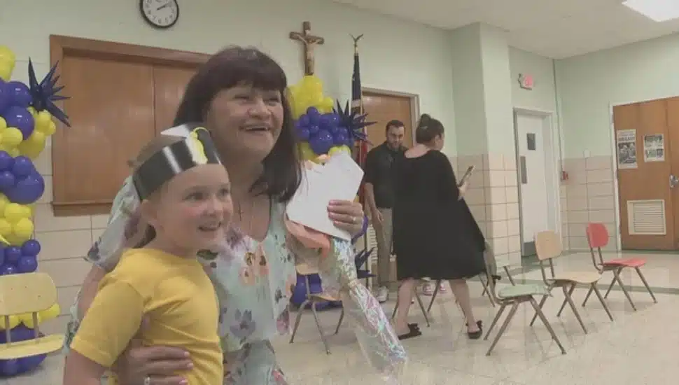 Maria Colozzo with a student during her graduation.