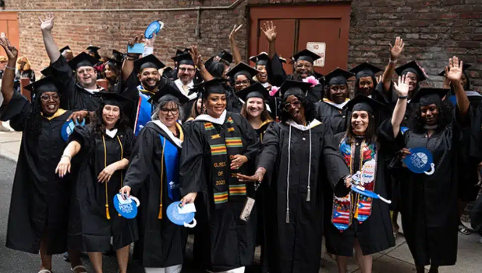 Peirce College graduates celebrating.