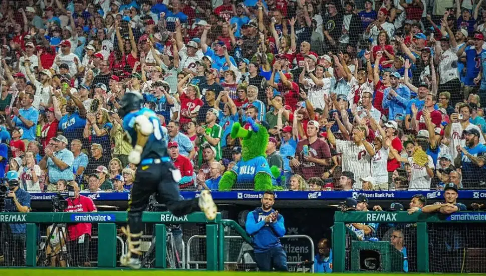 People in the stands enjoying a Philadelphia Phillies game.