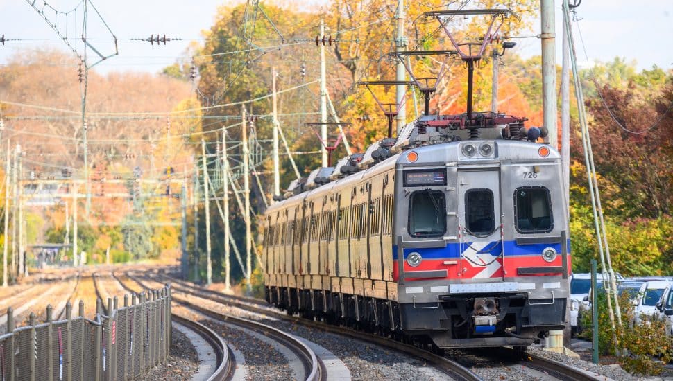 SEPTA train on Paoli/Thorndale Line in fall.