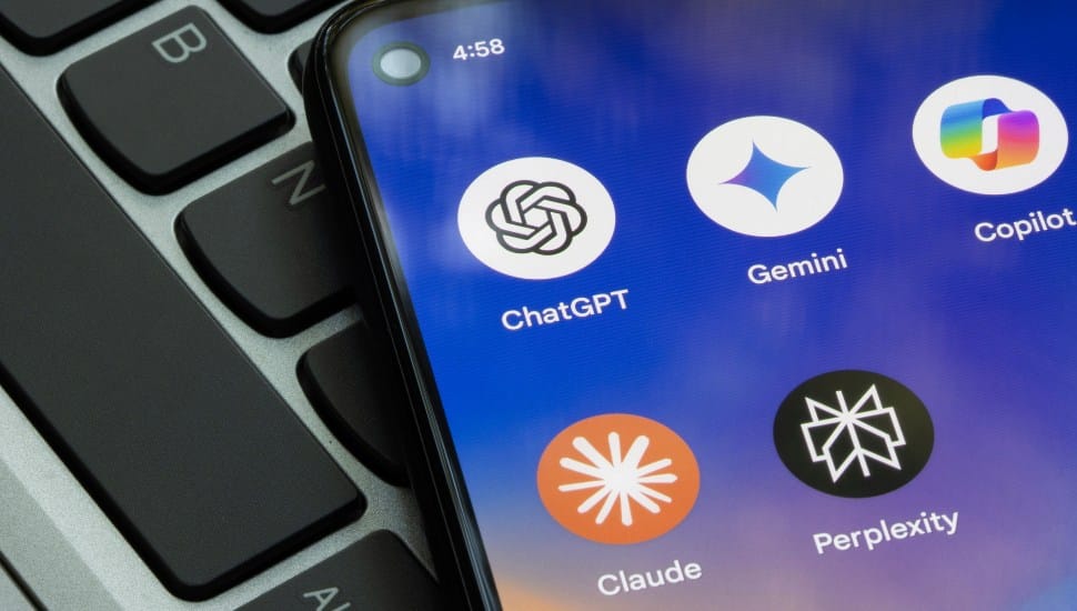 AI apps like ChatGPT on phone screen with keyboard underneath it.
